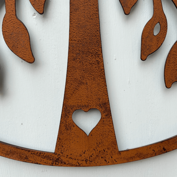 Circular rusted wall plaque 60cm. Tree with heart shape cut out