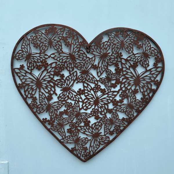 Heart rusty metal wall plaque with decorative cut out butterflies