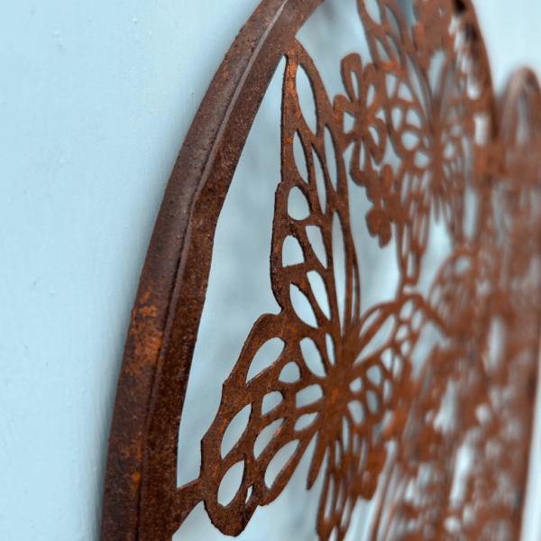 Heart rusty metal wall plaque with decorative cut out butterflies