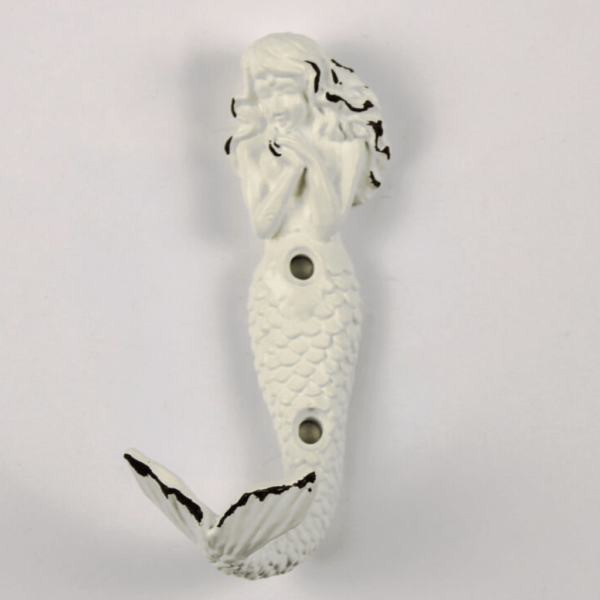 white mermaid wall hook with a distressed finish